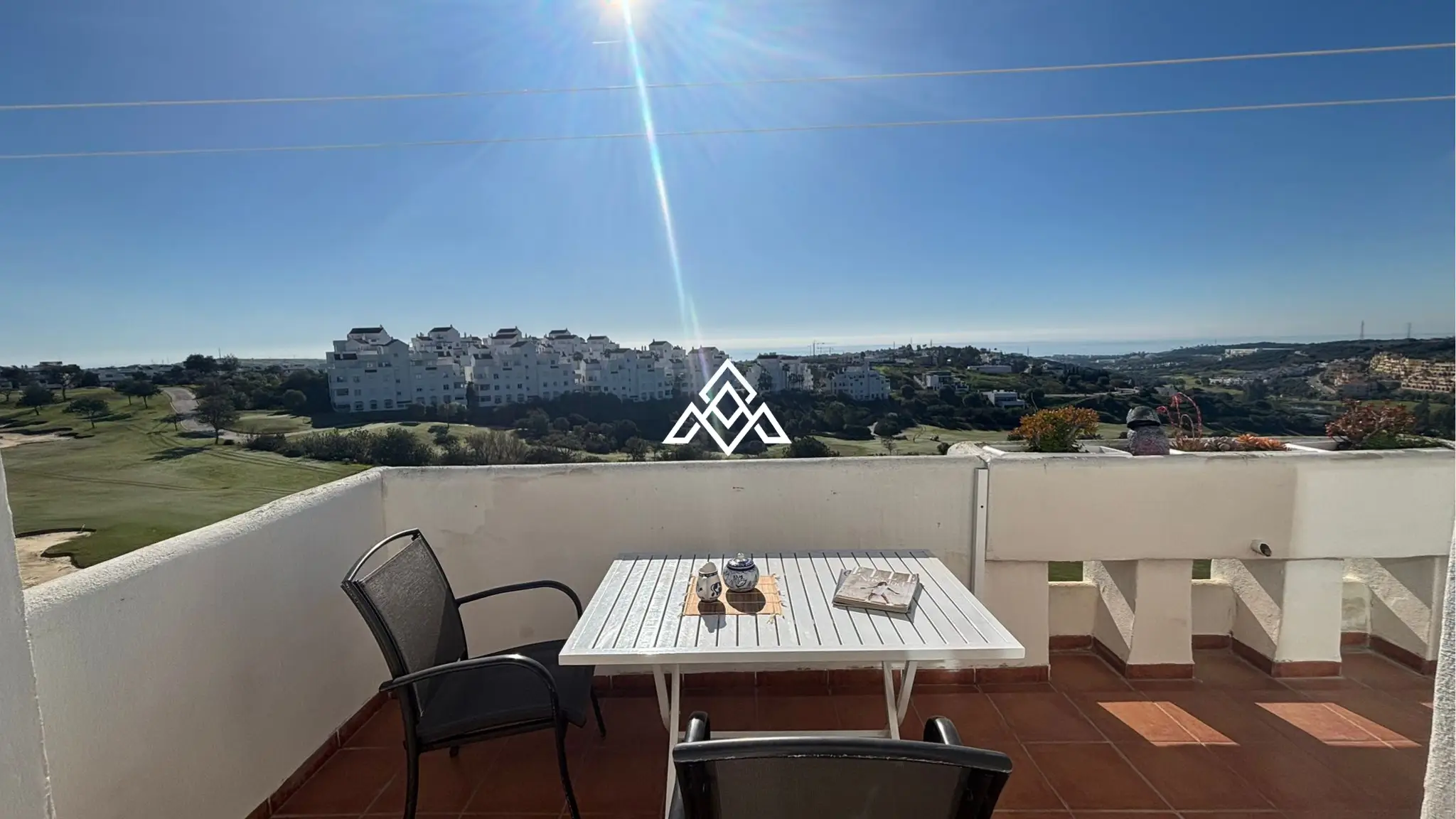 Valle Romano penthouse with private solarium and sea and golf views