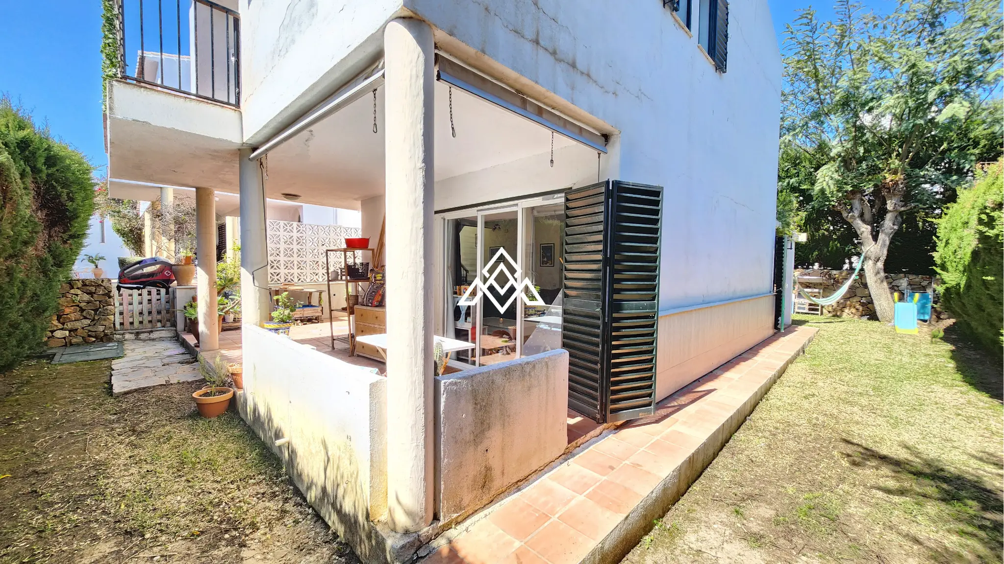 Corner Monte Biarritz townhouse with garden and terraces, near San Pedro