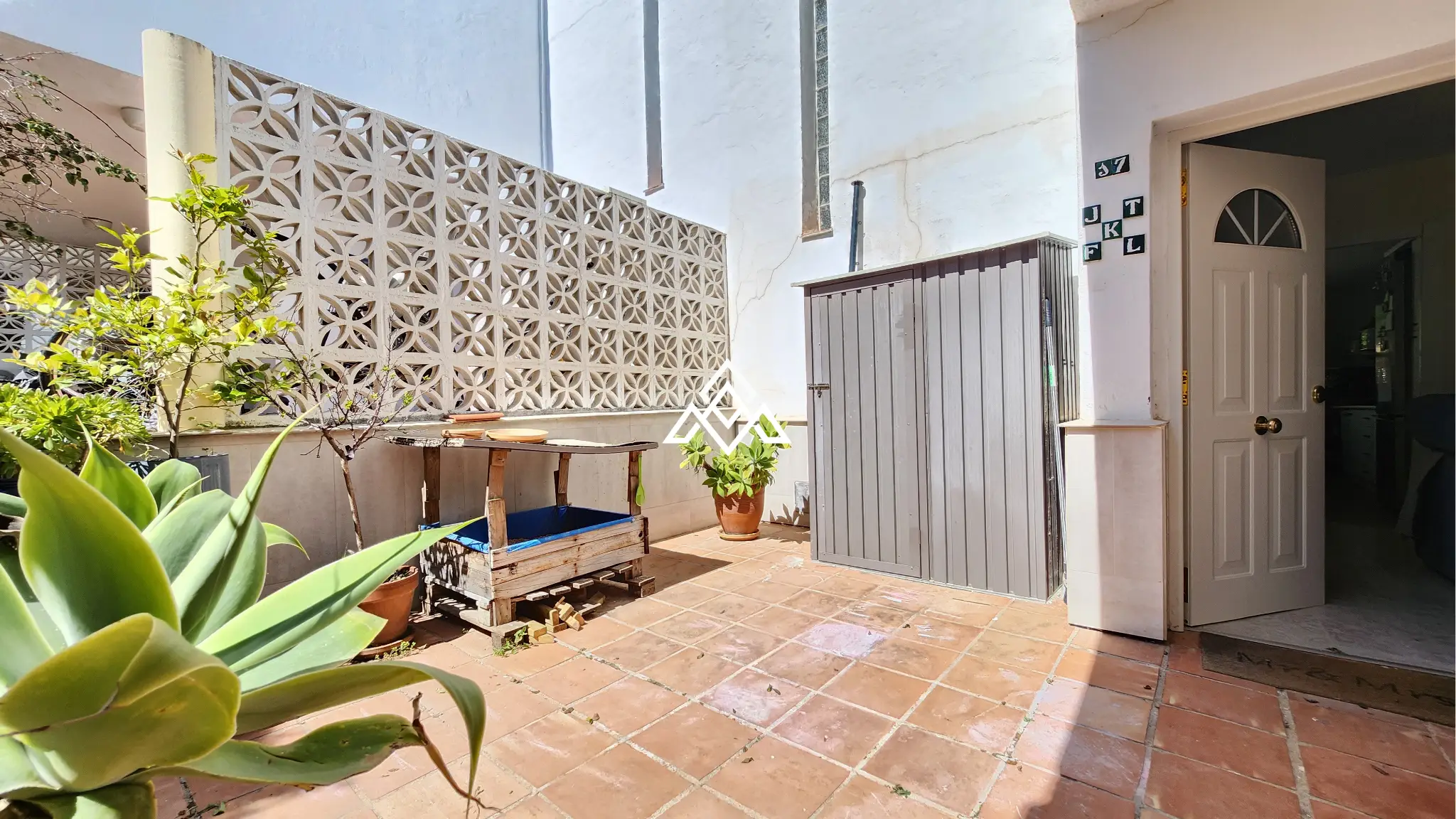 Corner Monte Biarritz townhouse with garden and terraces, near San Pedro