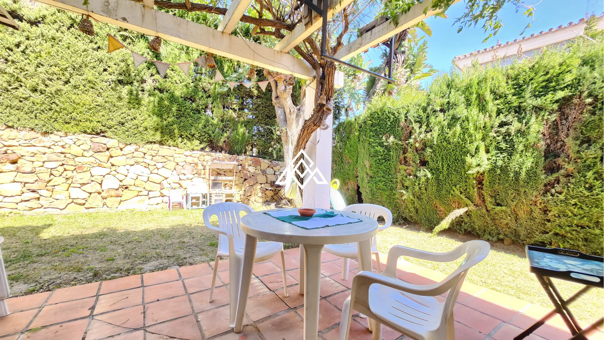 Corner Monte Biarritz townhouse with garden and terraces, near San Pedro