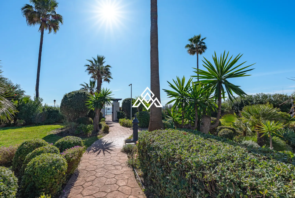 Bahía del Velerín sea-view garden apartment with private terrace and tropical gardens