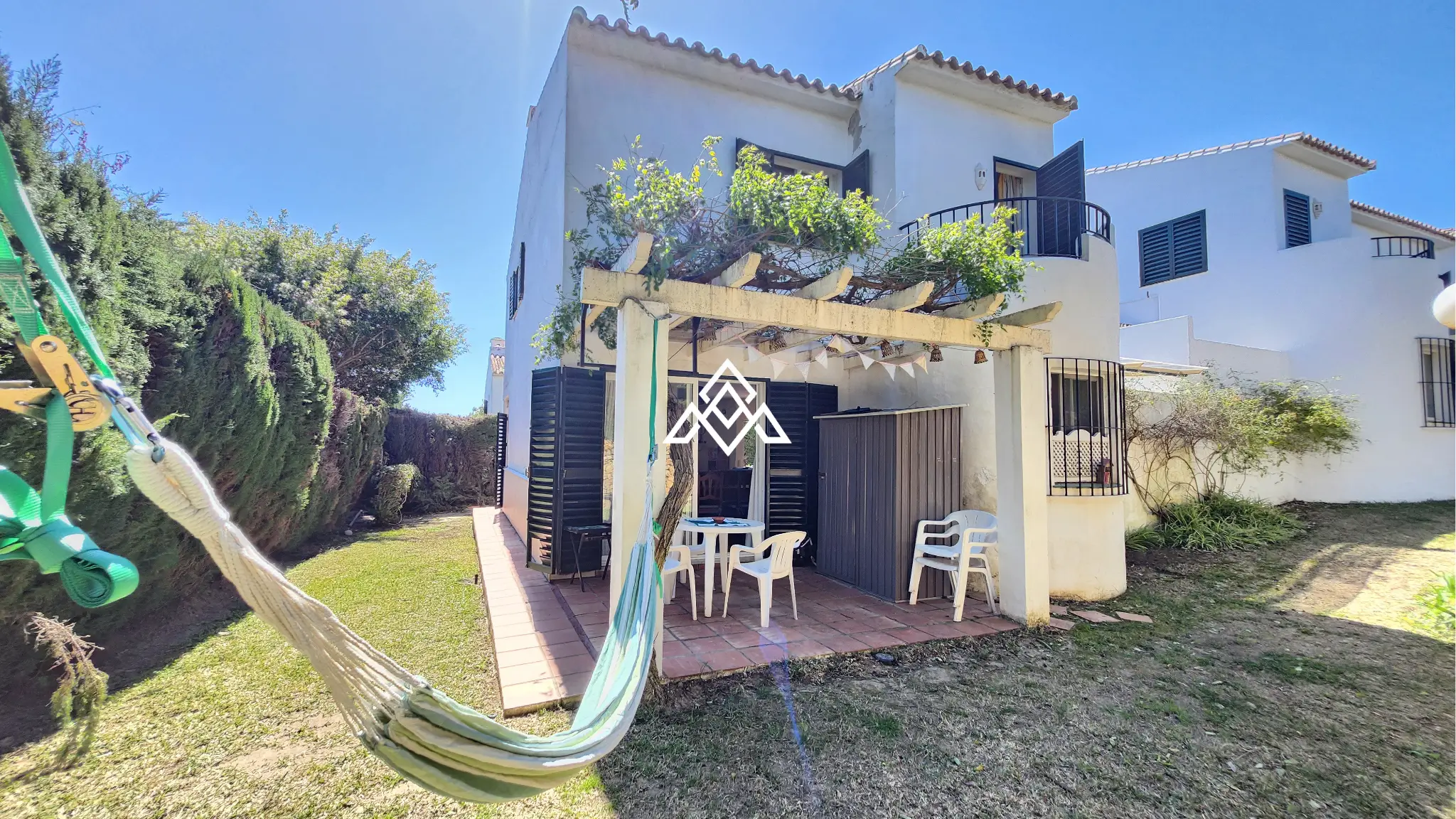 Corner Monte Biarritz townhouse with garden and terraces, near San Pedro