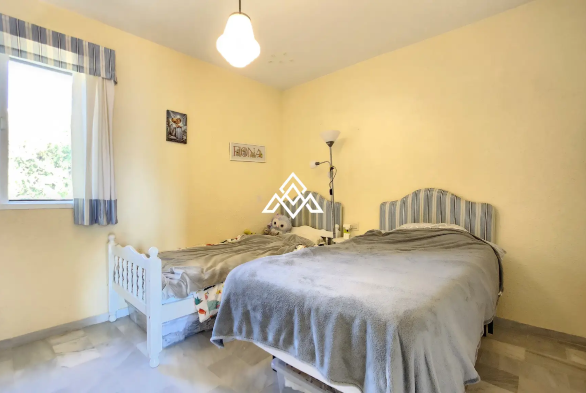 Corner Monte Biarritz townhouse with garden and terraces, near San Pedro