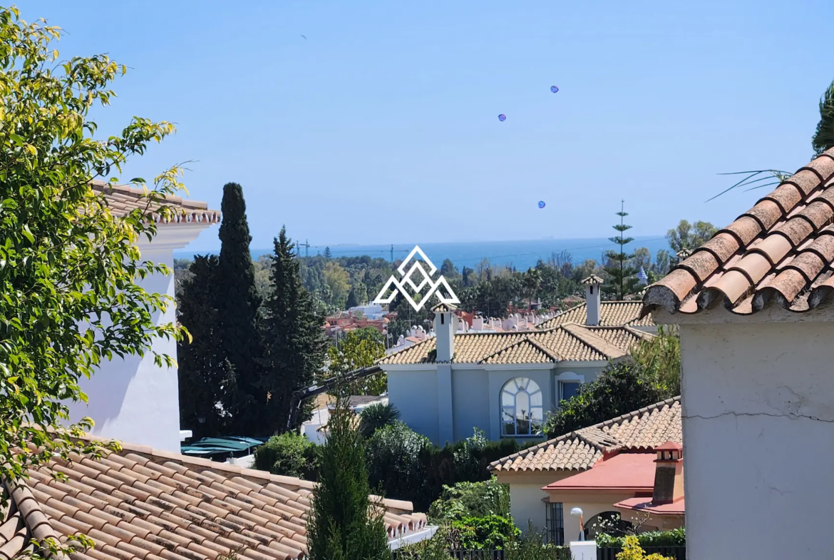Corner Monte Biarritz townhouse with garden and terraces, near San Pedro
