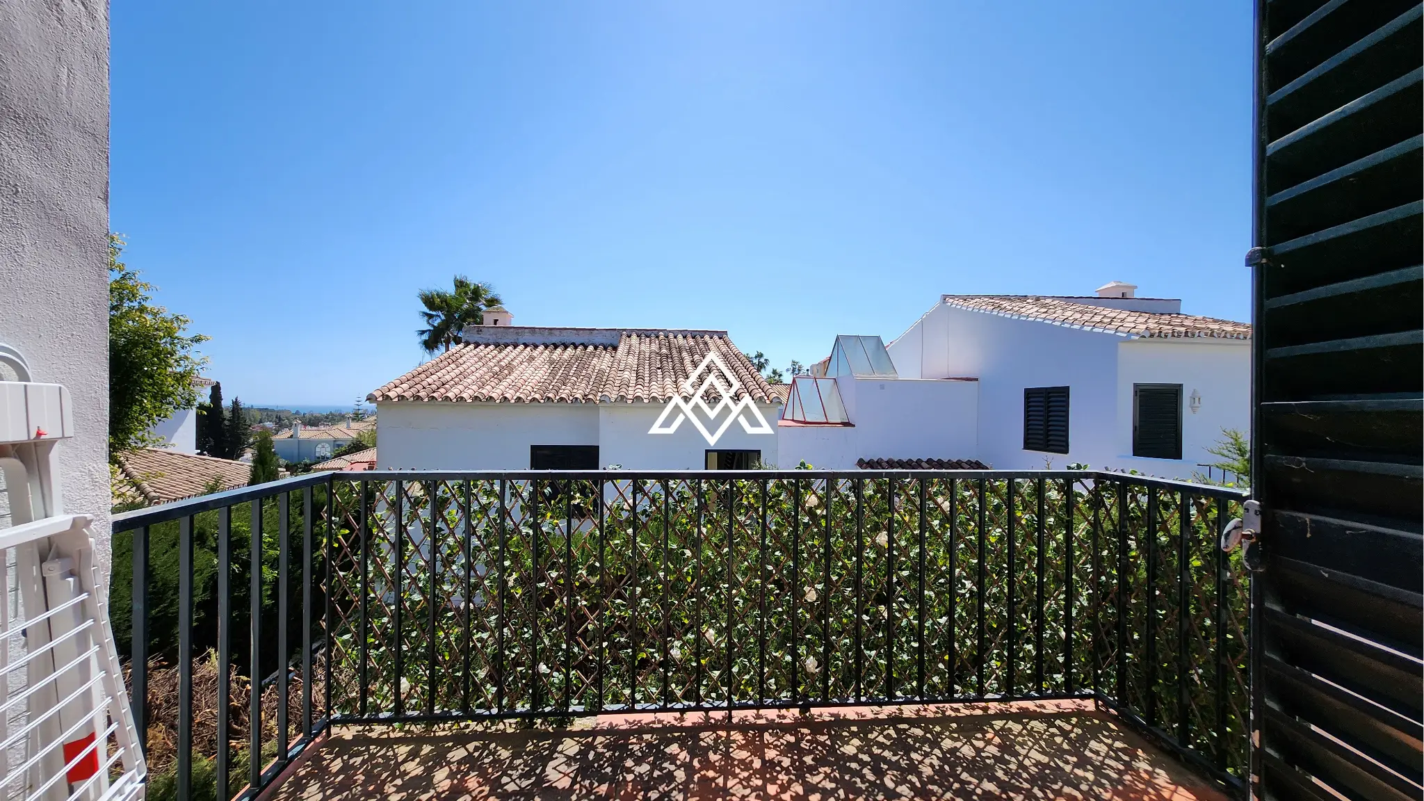Corner Monte Biarritz townhouse with garden and terraces, near San Pedro