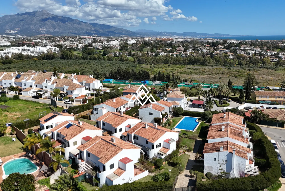 Corner Monte Biarritz townhouse with garden and terraces, near San Pedro