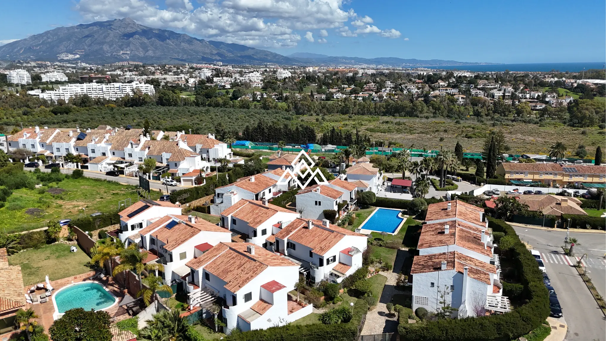 Corner Monte Biarritz townhouse with garden and terraces, near San Pedro