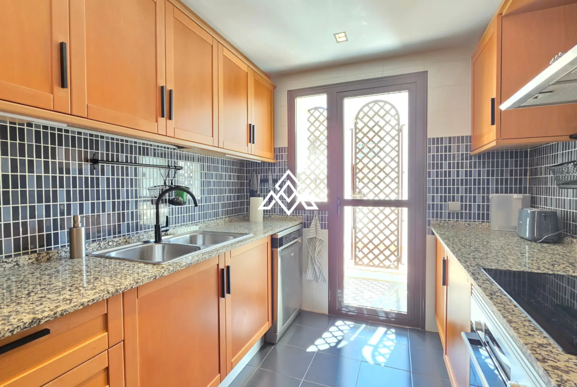 Selwo apartment with terrace, pool and gardens in gated community Estepona
