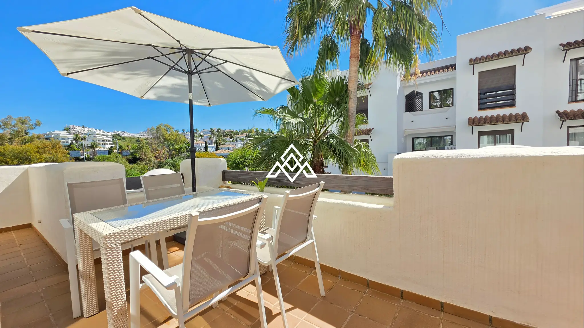 Selwo apartment with terrace, pool and gardens in gated community Estepona