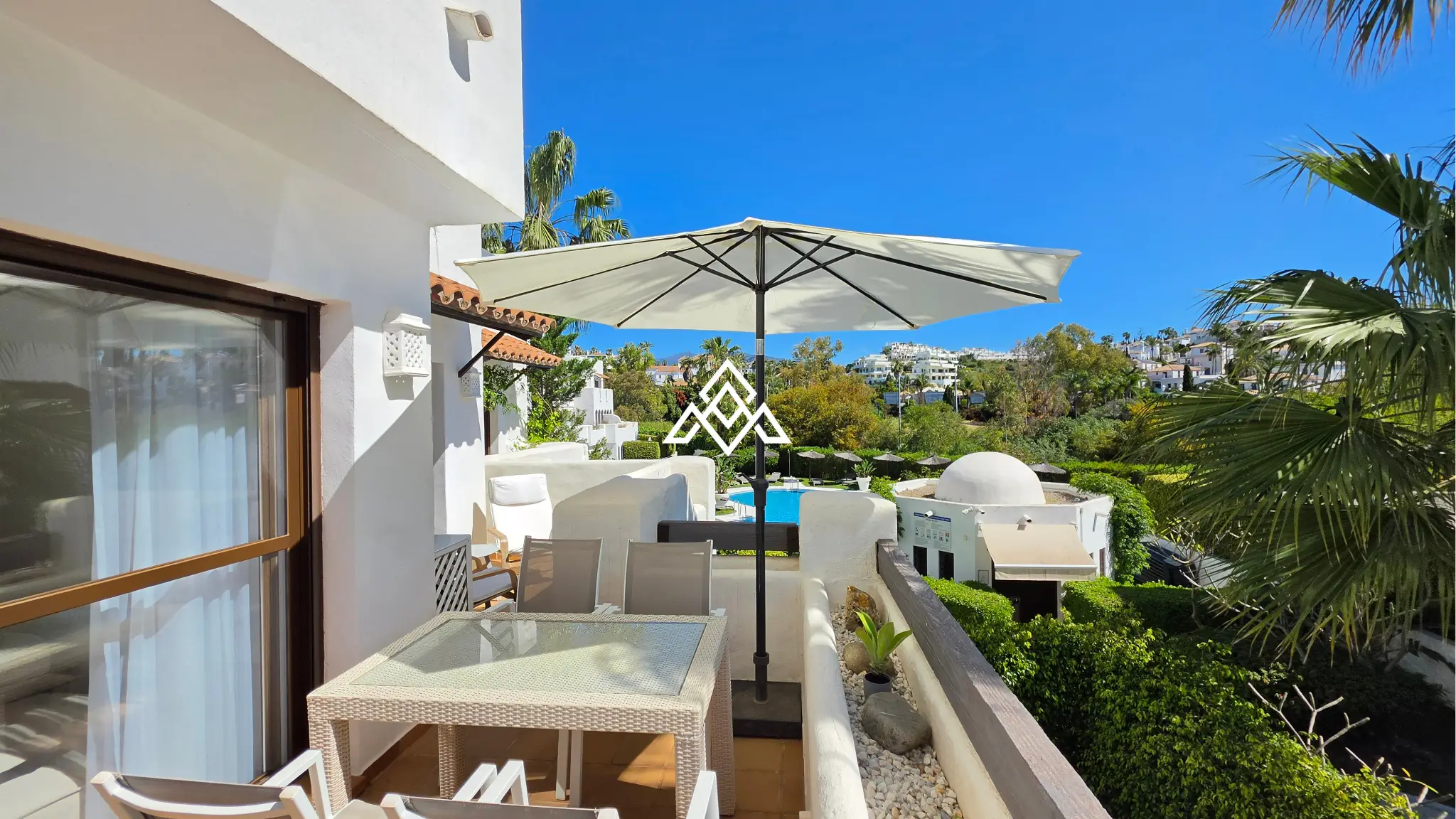 Selwo apartment with terrace, pool and gardens in gated community Estepona