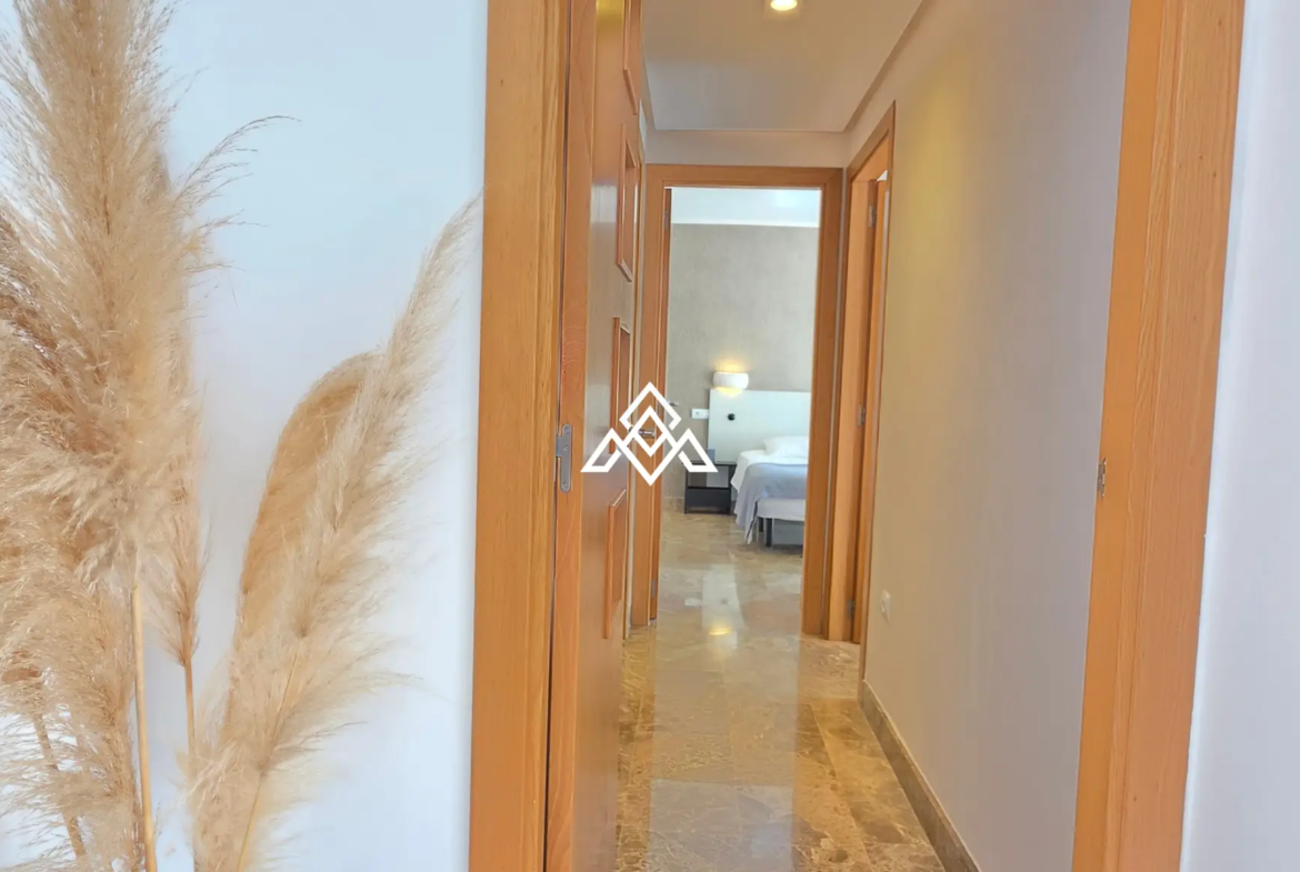 Selwo apartment with terrace, pool and gardens in gated community Estepona