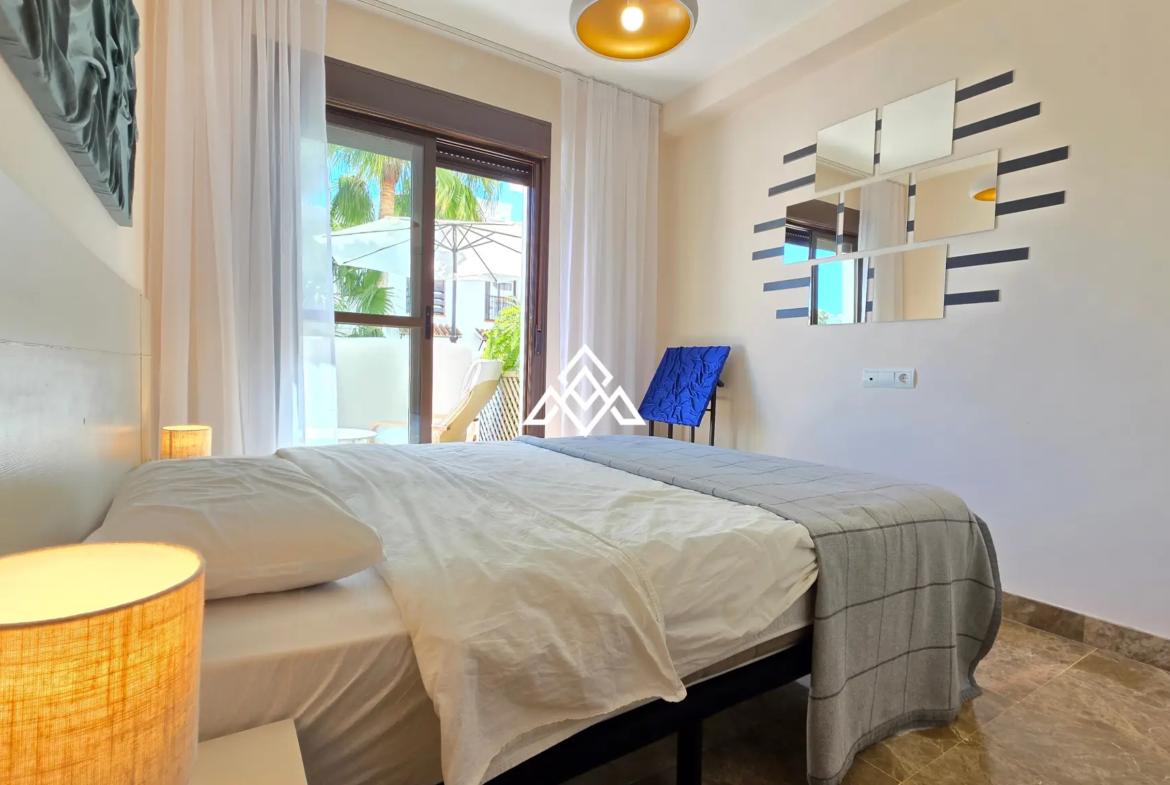 Selwo apartment with terrace, pool and gardens in gated community Estepona
