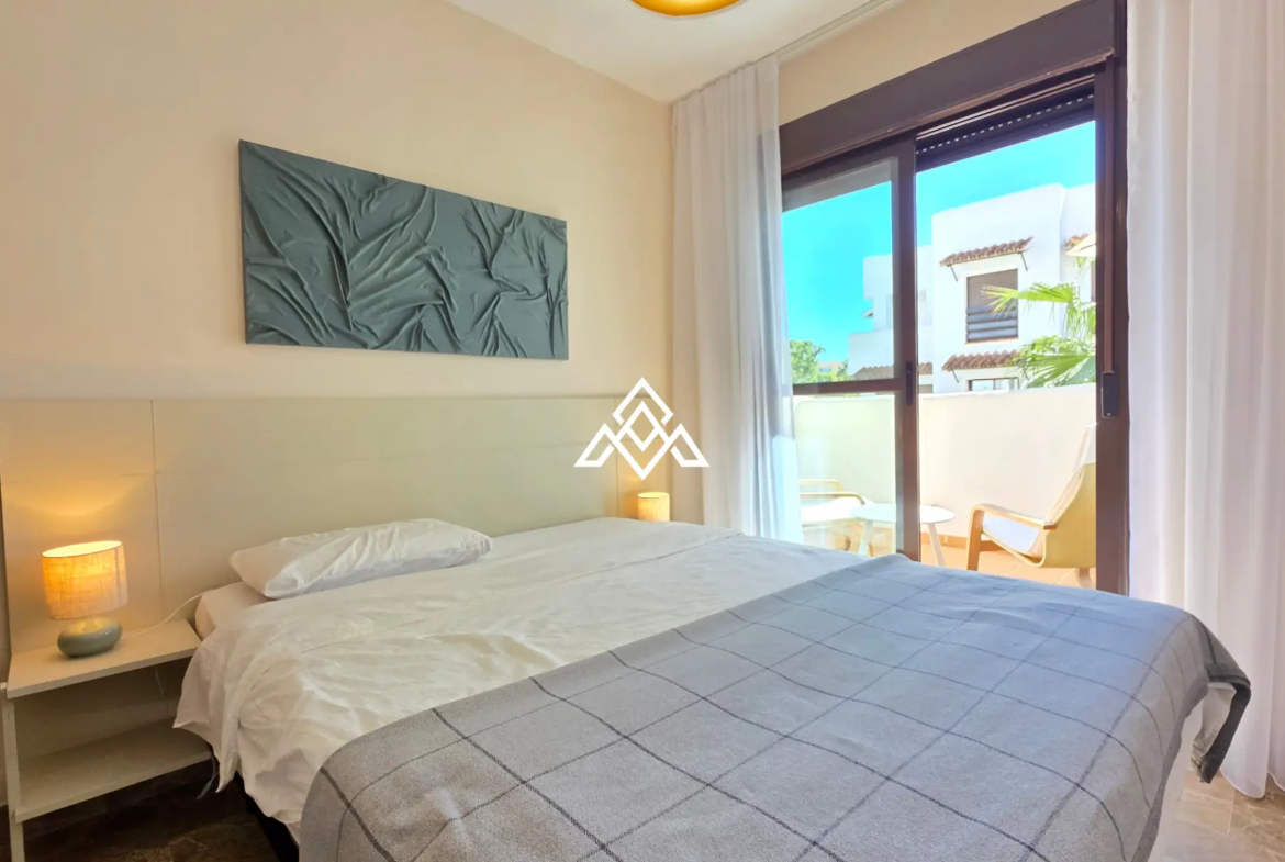 Selwo apartment with terrace, pool and gardens in gated community Estepona