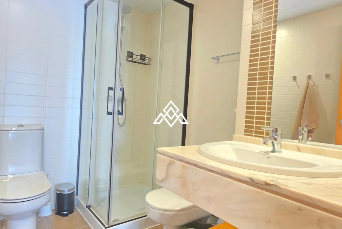 Selwo apartment with terrace, pool and gardens in gated community Estepona