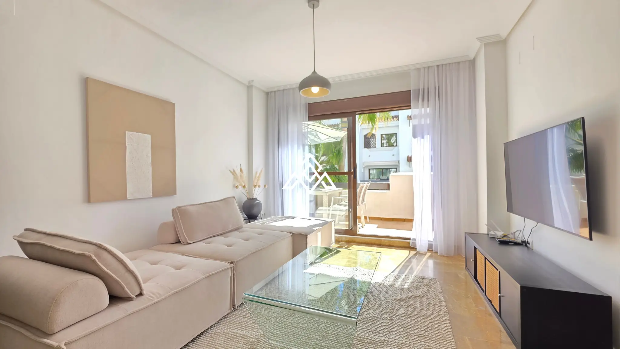Selwo apartment with terrace, pool and gardens in gated community Estepona