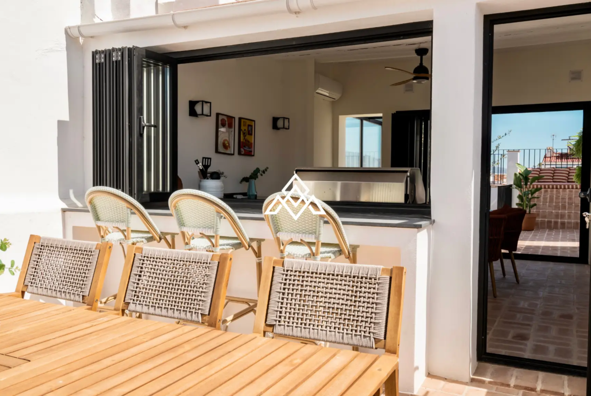 Designer townhouse with rooftop pool and panoramic sea views on Costa del Sol