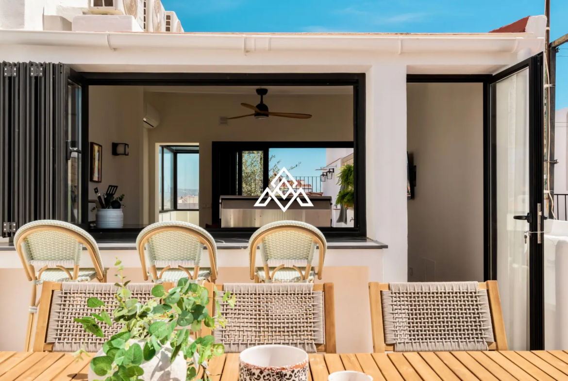 Designer townhouse with rooftop pool and panoramic sea views on Costa del Sol