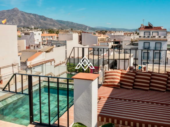 Designer townhouse with rooftop pool and panoramic sea views on Costa del Sol