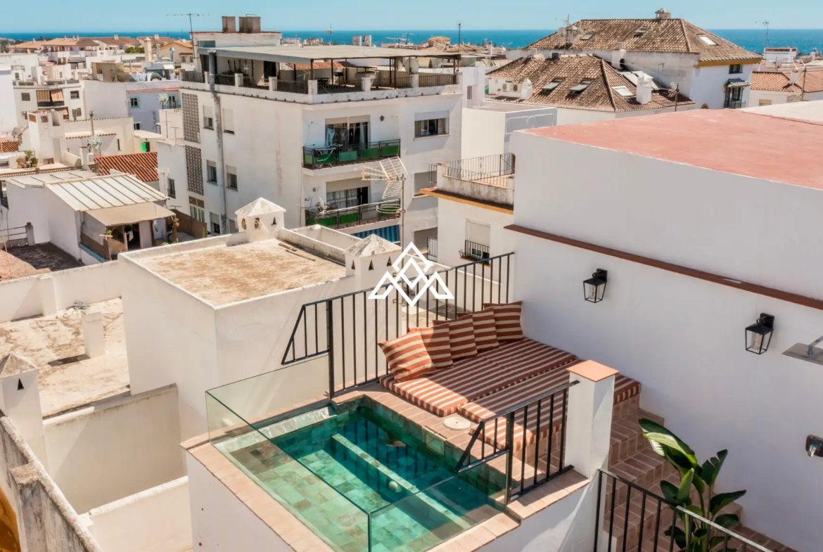 Designer townhouse with rooftop pool and panoramic sea views on Costa del Sol