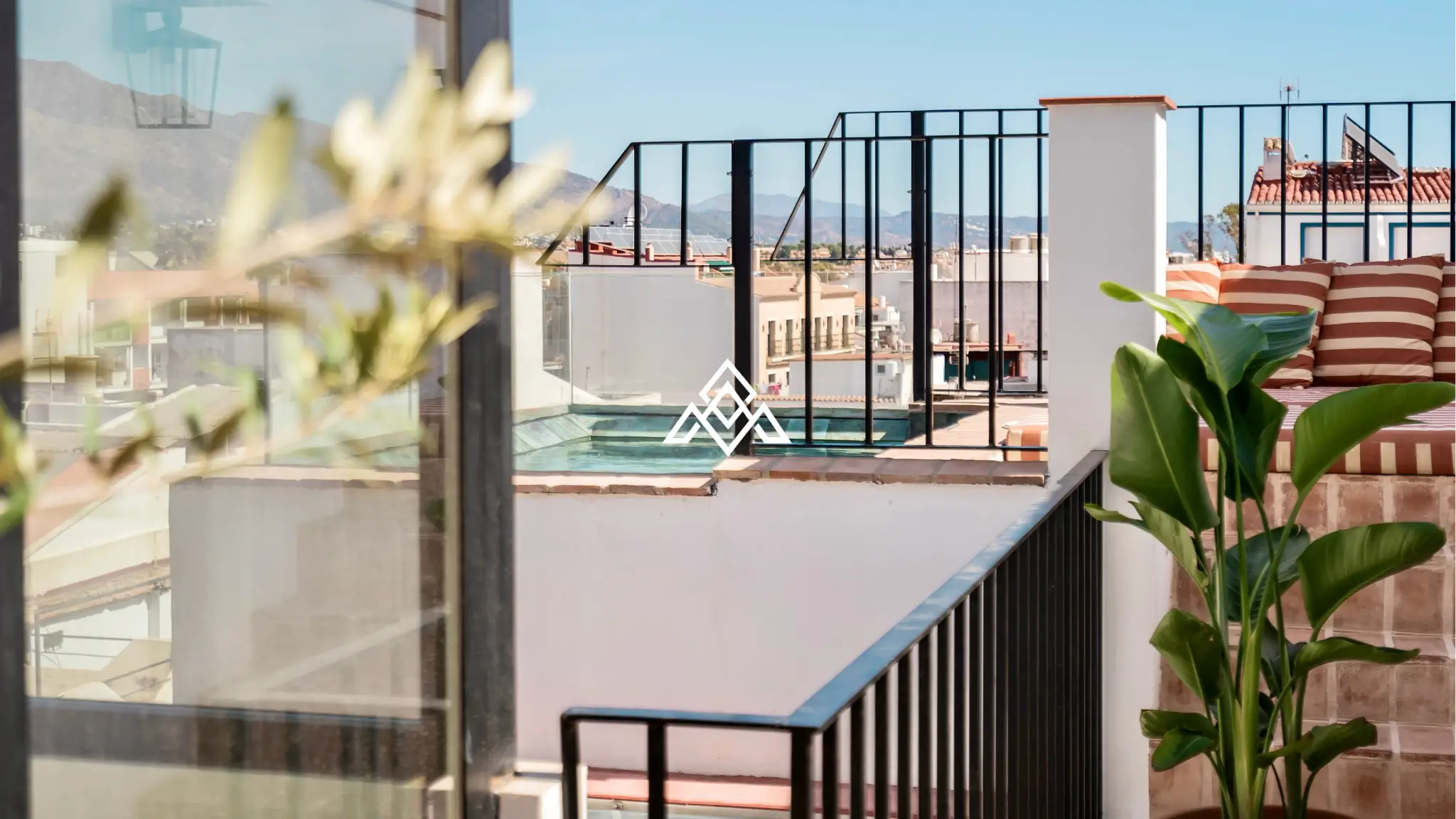 Designer townhouse with rooftop pool and panoramic sea views on Costa del Sol