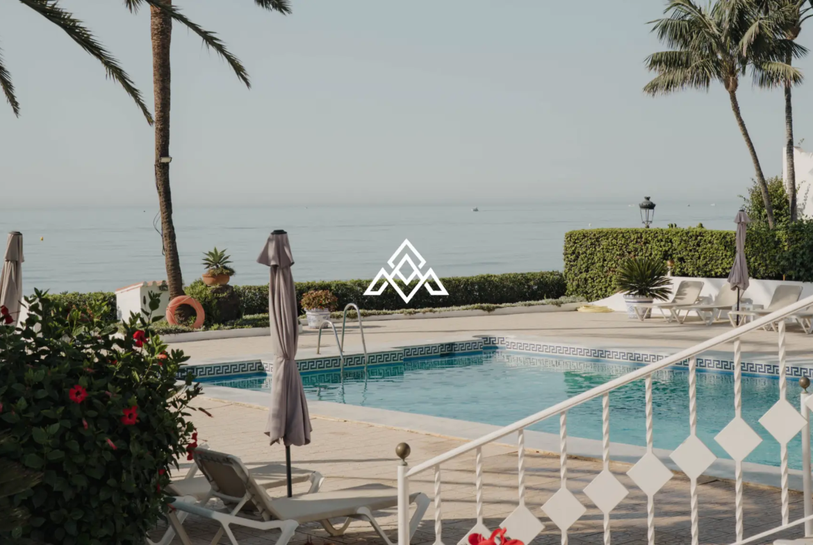 Exclusive Golden Mile Beach House in Marbella with private pool, sea views and direct beach access. Prime Spain real estate opportunity.