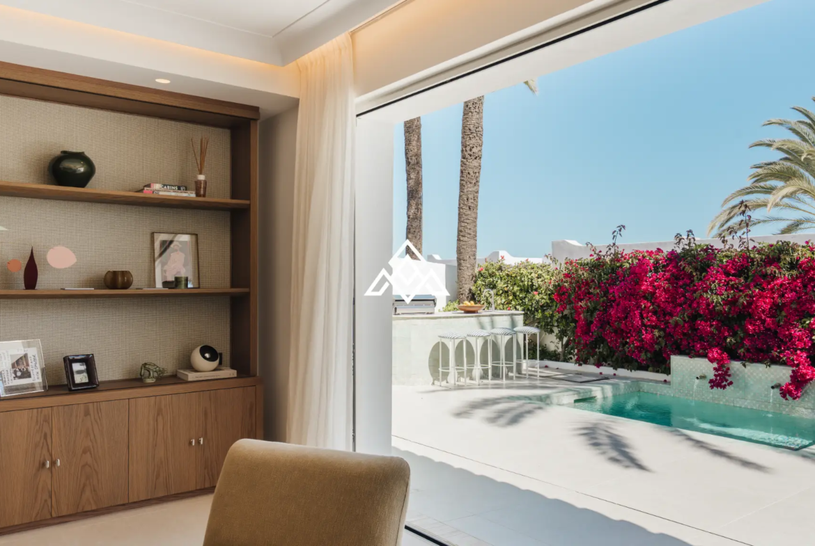 Exclusive Golden Mile Beach House in Marbella with private pool, sea views and direct beach access. Prime Spain real estate opportunity.