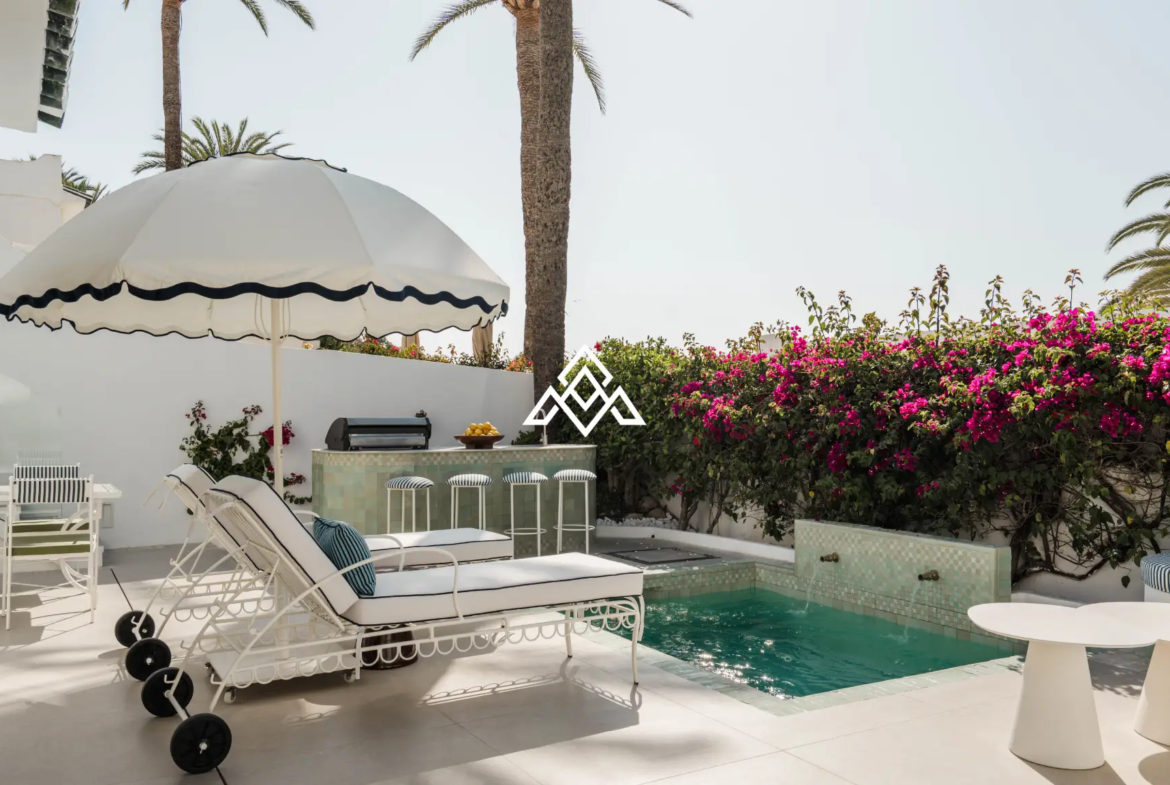 Exclusive Golden Mile Beach House in Marbella with private pool, sea views and direct beach access. Prime Spain real estate opportunity.