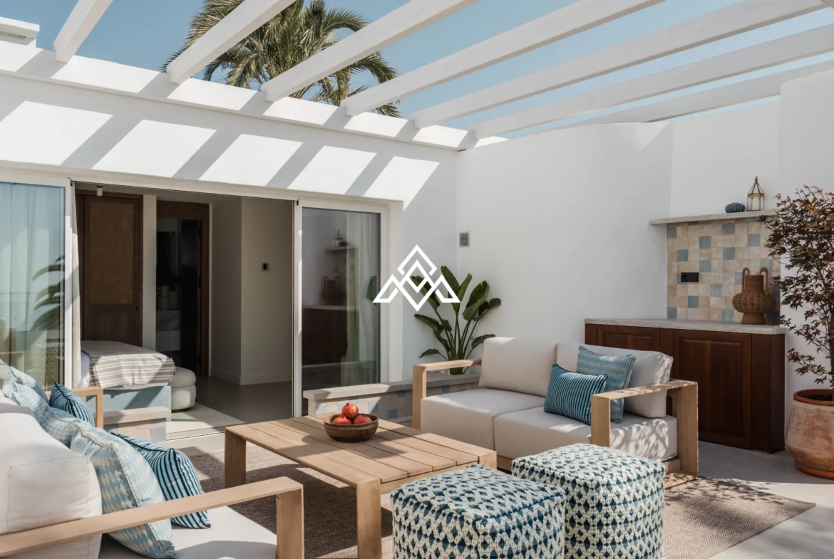 Exclusive Golden Mile Beach House in Marbella with private pool, sea views and direct beach access. Prime Spain real estate opportunity.
