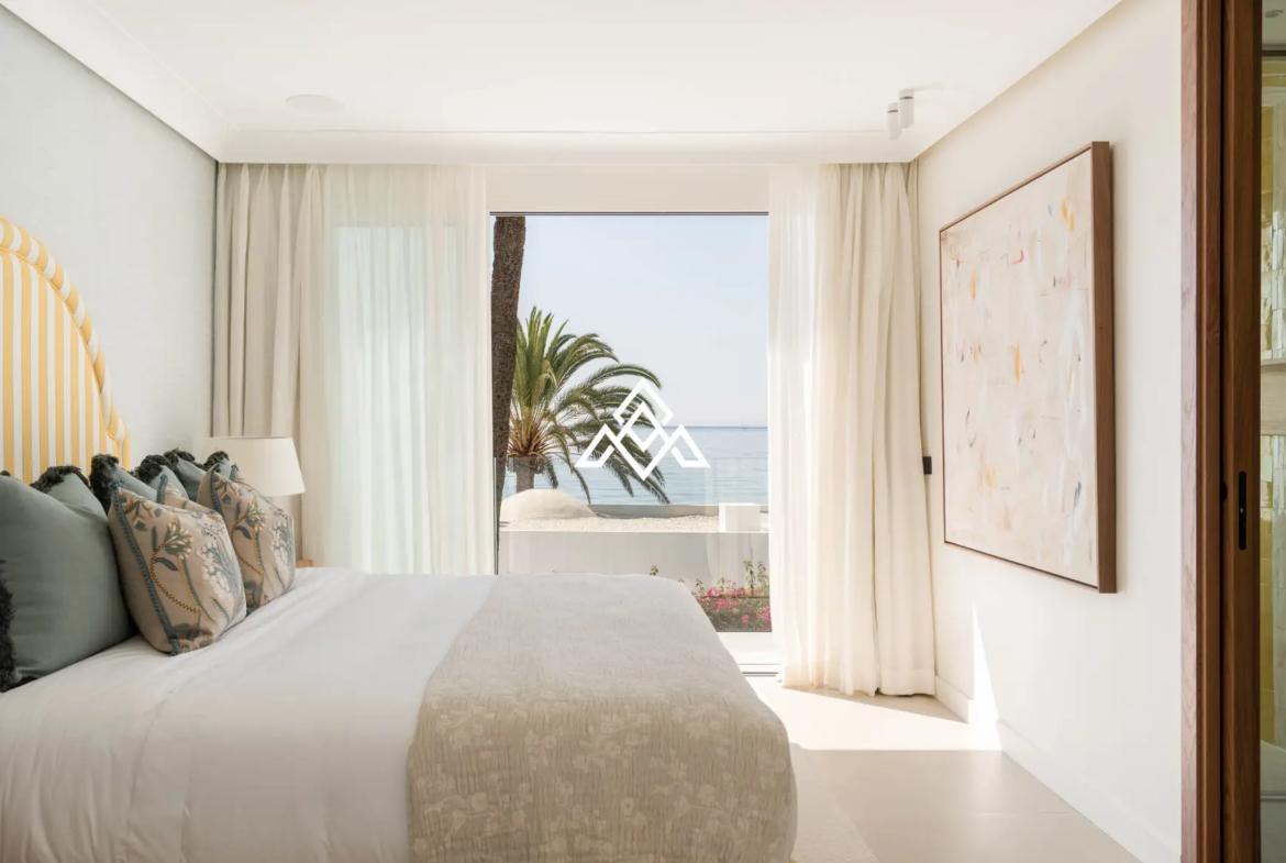 Exclusive Golden Mile Beach House in Marbella with private pool, sea views and direct beach access. Prime Spain real estate opportunity.
