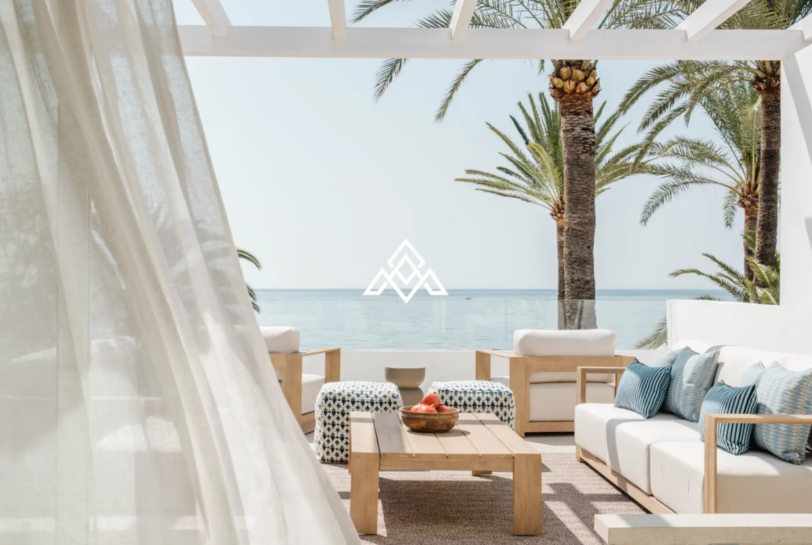 Exclusive Golden Mile Beach House in Marbella with private pool, sea views and direct beach access. Prime Spain real estate opportunity.