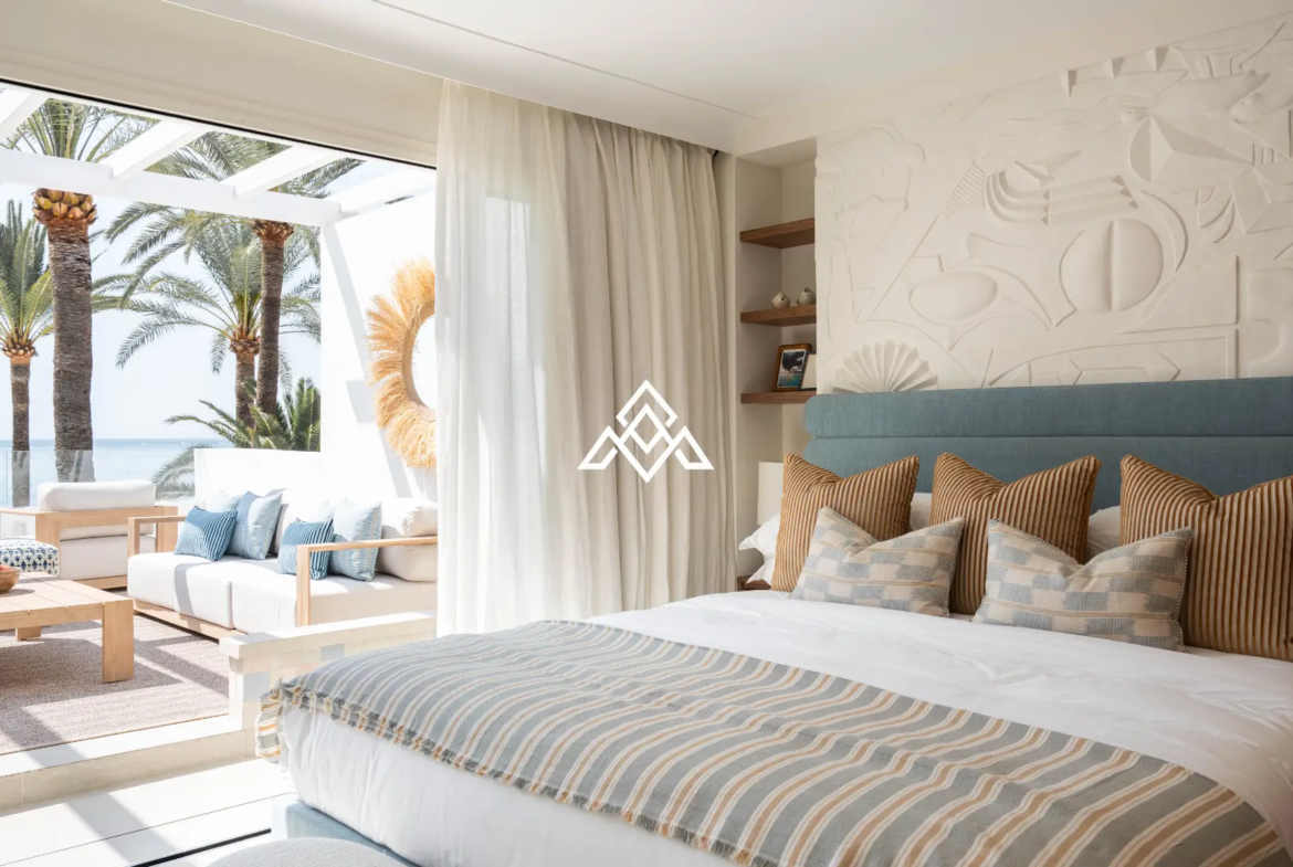 Exclusive Golden Mile Beach House in Marbella with private pool, sea views and direct beach access. Prime Spain real estate opportunity.