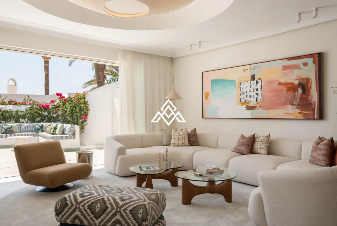 Exclusive Golden Mile Beach House in Marbella with private pool, sea views and direct beach access. Prime Spain real estate opportunity.