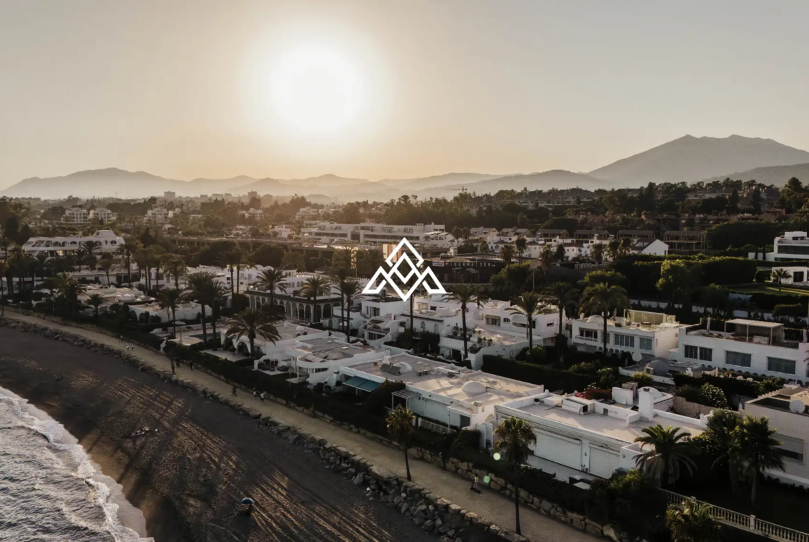 Exclusive Golden Mile Beach House in Marbella with private pool, sea views and direct beach access. Prime Spain real estate opportunity.