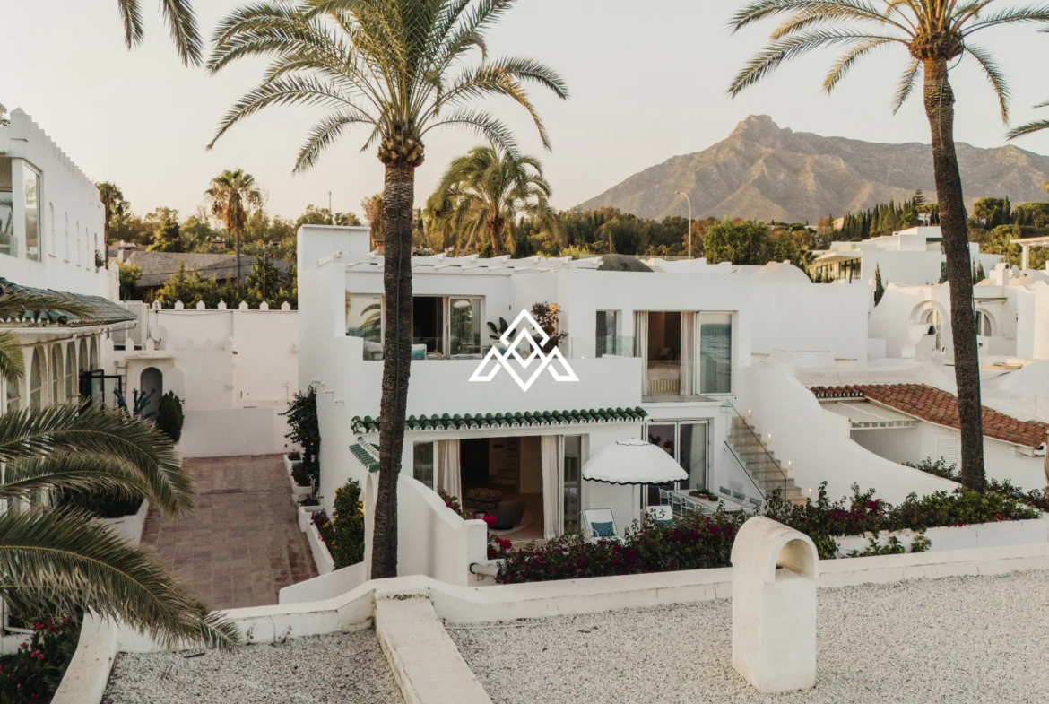 Exclusive Golden Mile Beach House in Marbella with private pool, sea views and direct beach access. Prime Spain real estate opportunity.