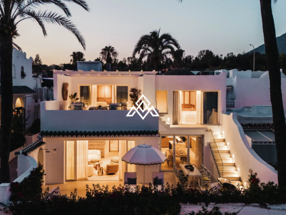 Exclusive Golden Mile Beach House in Marbella with private pool, sea views and direct beach access. Prime Spain real estate opportunity.