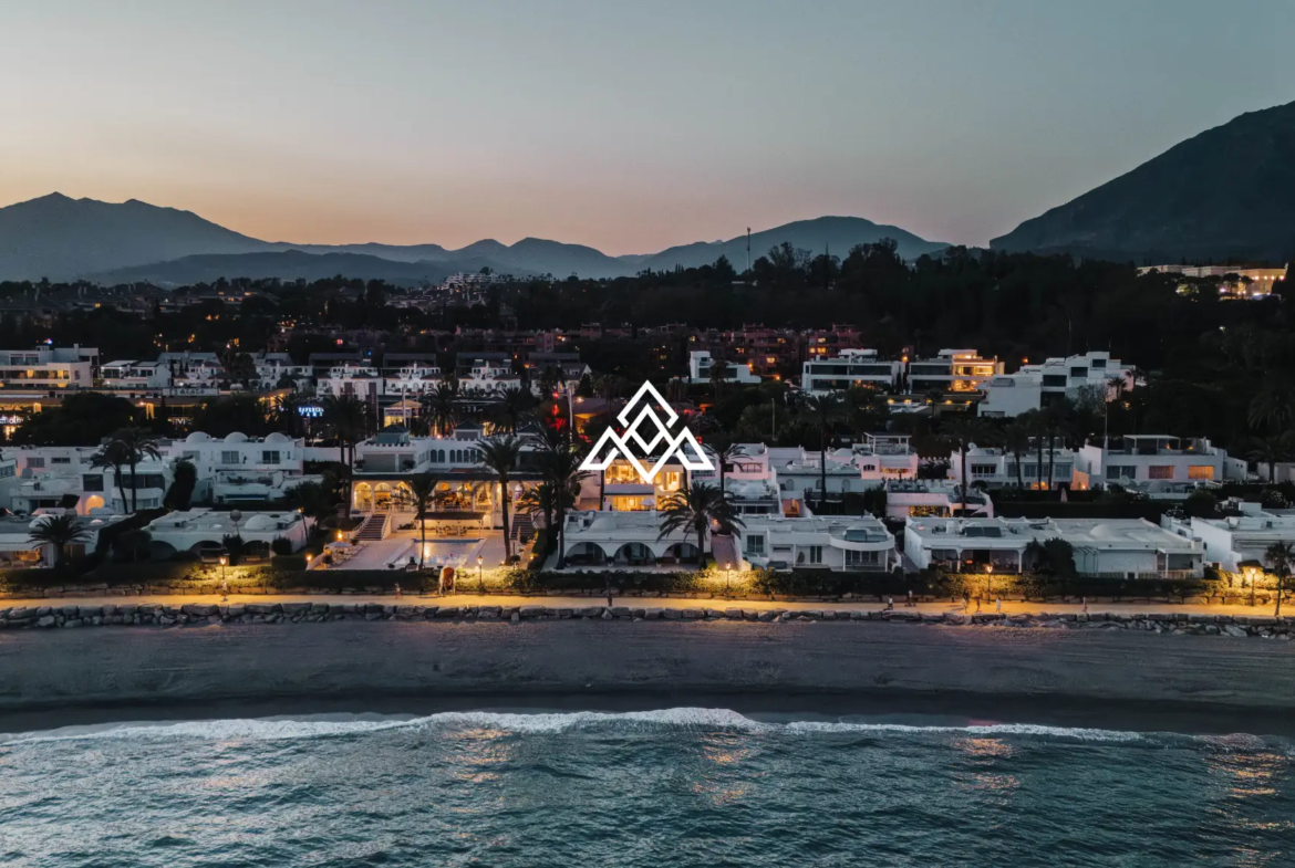 Exclusive Golden Mile Beach House in Marbella with private pool, sea views and direct beach access. Prime Spain real estate opportunity.
