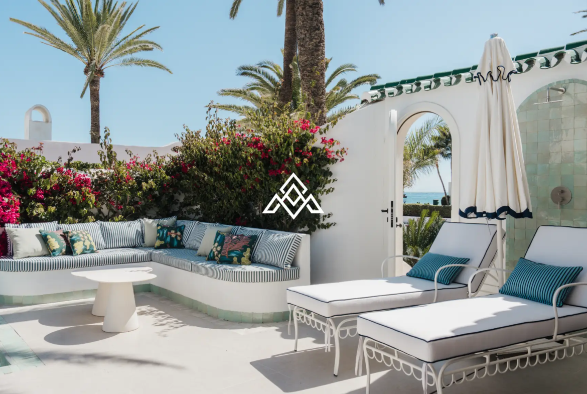 Exclusive Golden Mile Beach House in Marbella with private pool, sea views and direct beach access. Prime Spain real estate opportunity.