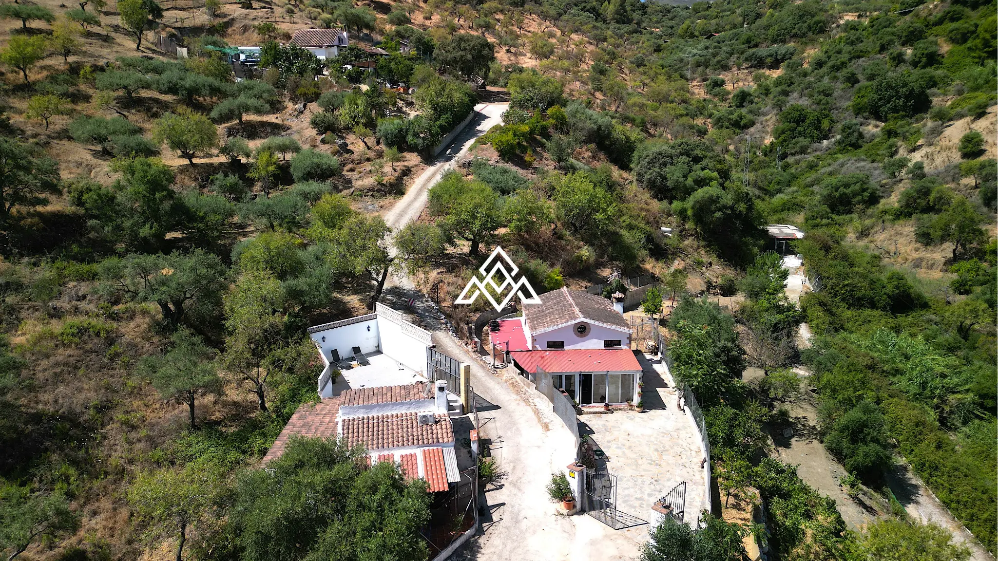 Charming Rustic Estate Monda with two independent homes, mountain views and 3,200 m² of land. Spain real estate investment near Málaga.