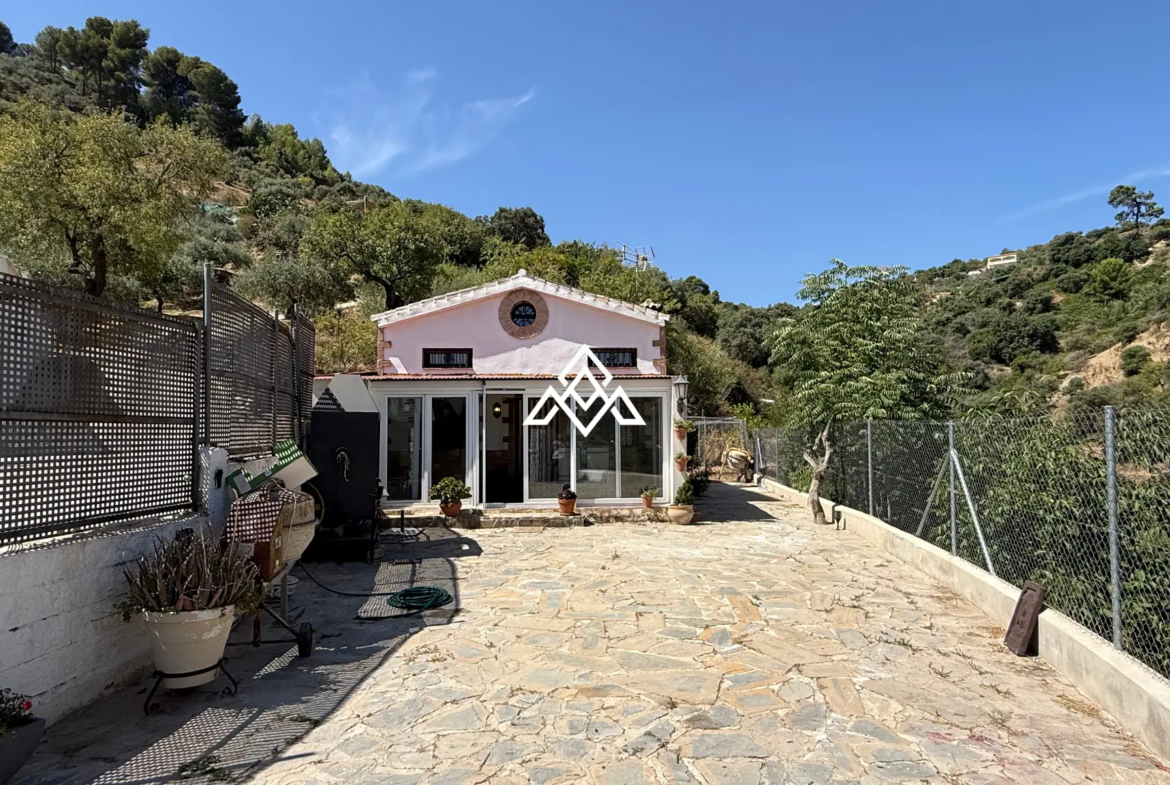 Charming Rustic Estate Monda with two independent homes, mountain views and 3,200 m² of land. Spain real estate investment near Málaga.