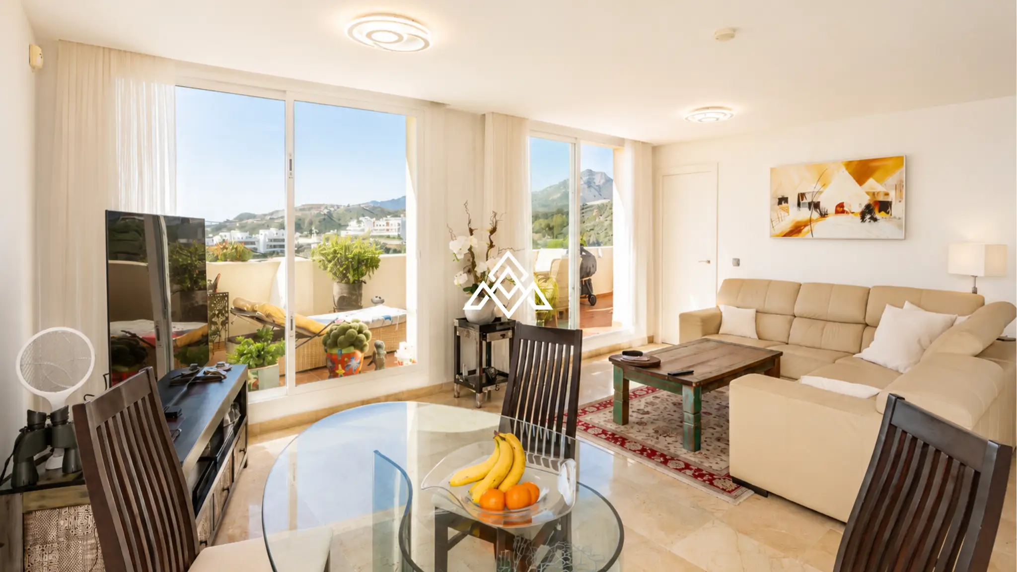 Luxury Benahavis Apartment with panoramic sea, golf and lake views, renovated interiors and terrace. Prime Spain real estate opportunity.