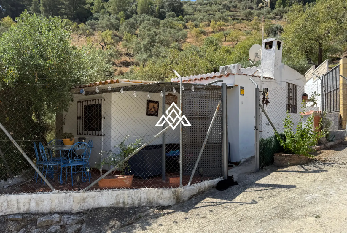 Charming Rustic Estate Monda with two independent homes, mountain views and 3,200 m² of land. Spain real estate investment near Málaga.