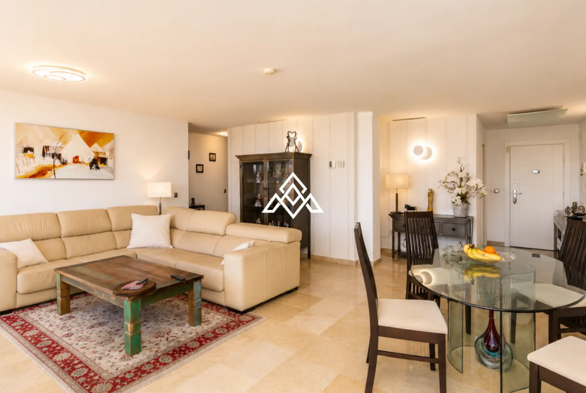 Luxury Benahavis Apartment with panoramic sea, golf and lake views, renovated interiors and terrace. Prime Spain real estate opportunity.