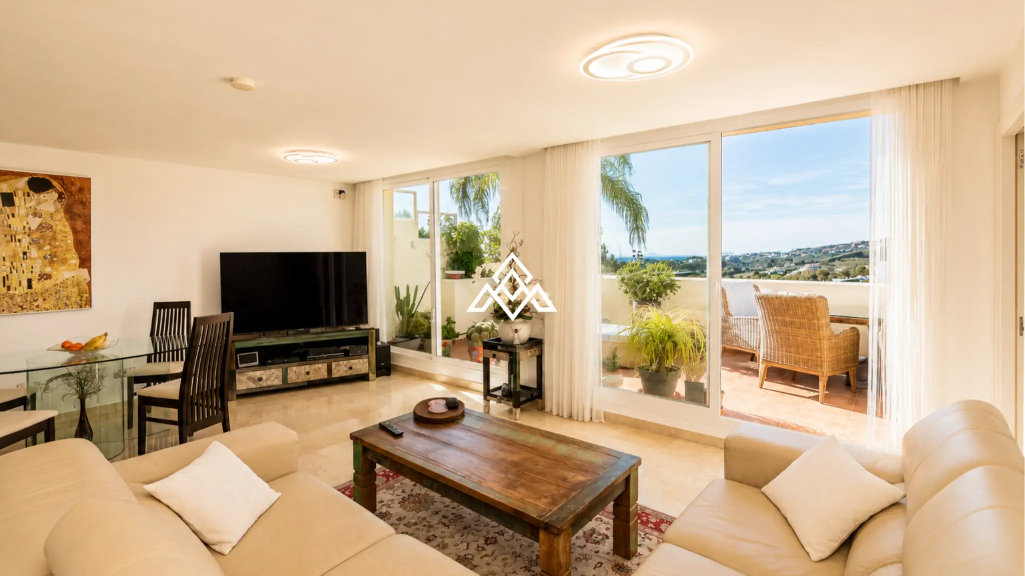 Luxury Benahavis Apartment with panoramic sea, golf and lake views, renovated interiors and terrace. Prime Spain real estate opportunity.