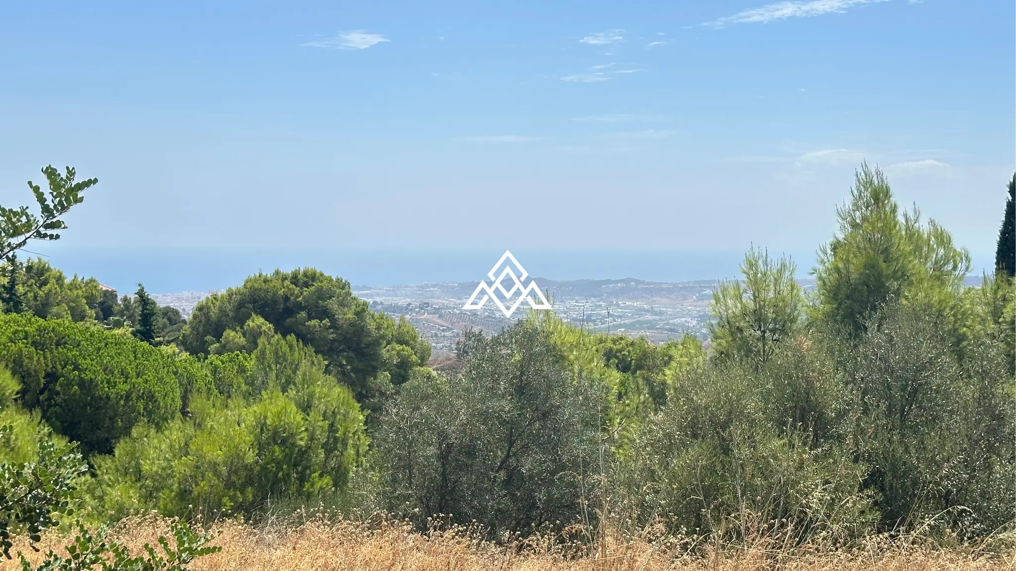 Valtocado urban plot in Mijas with panoramic sea views, up to 5,000 m² of land and residential building potential. Prime Spain real estate opportunity.