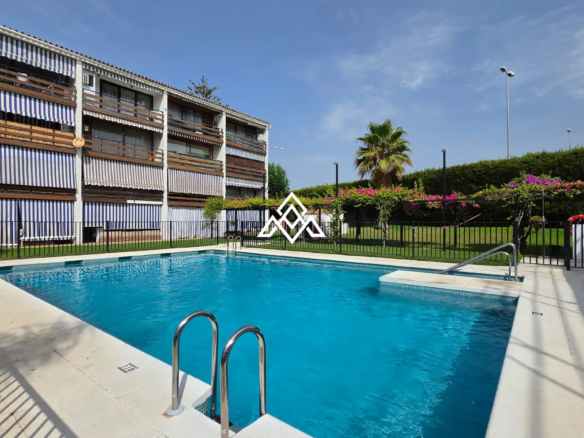 Charming Cortijo Blanco Penthouse near the beach and Puerto Banús. Great Spain real estate investment with terrace and pool views.