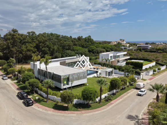 Luxury La Reserva villa for sale in Sotogrande with panoramic sea views and indoor swimming pool.
