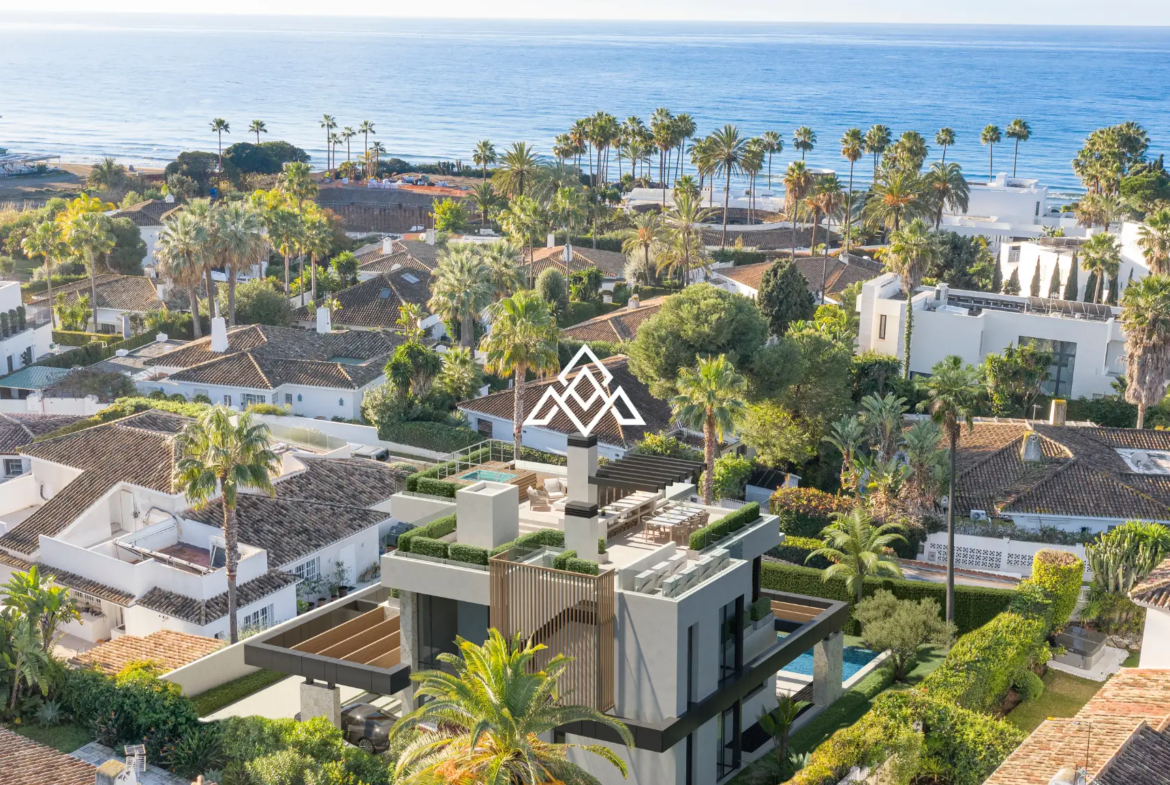 Luxury Los Monteros villa for sale with panoramic sea views, infinity pool and rooftop jacuzzi in Marbella.