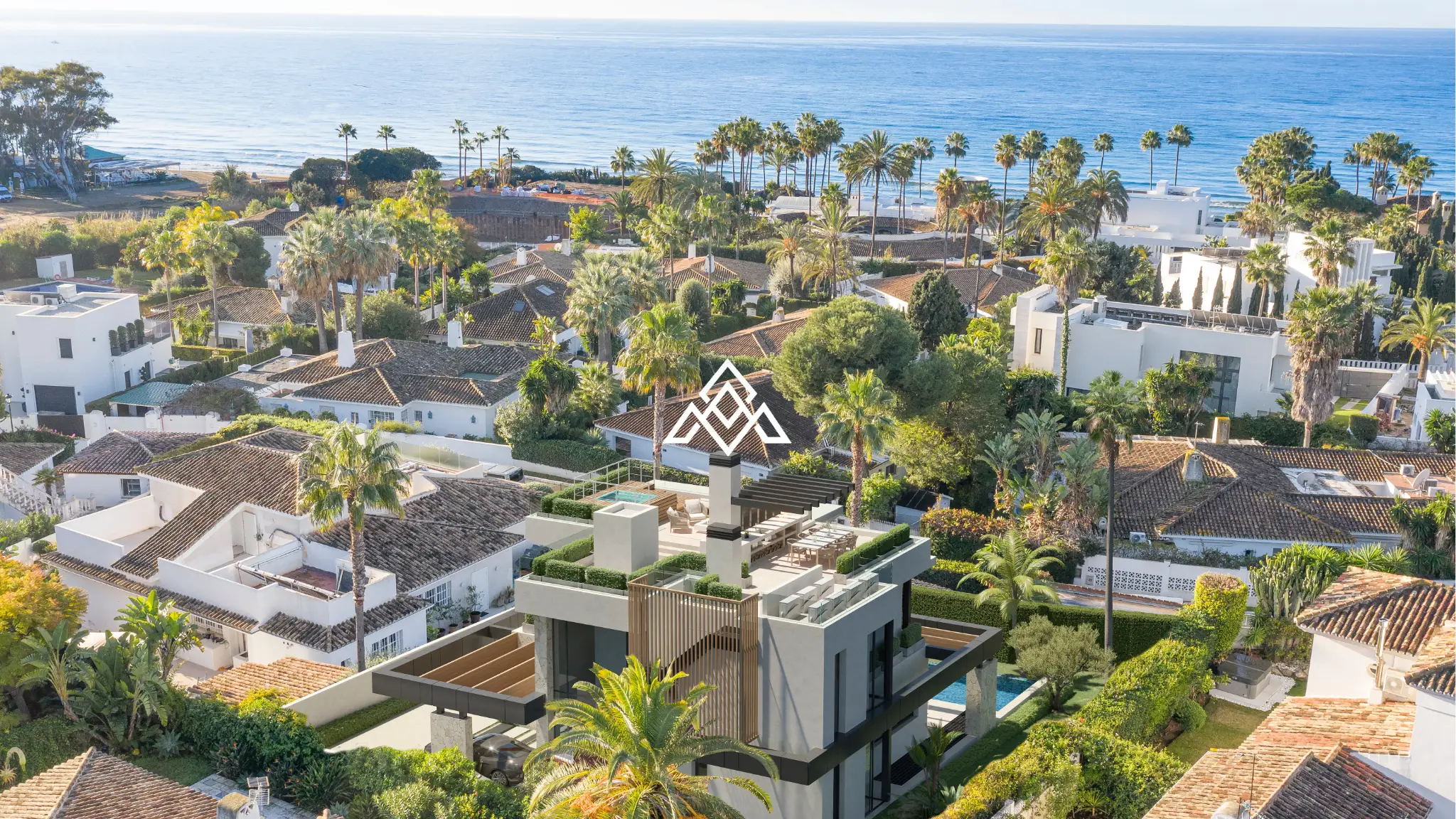 Luxury Los Monteros villa for sale with panoramic sea views, infinity pool and rooftop jacuzzi in Marbella.