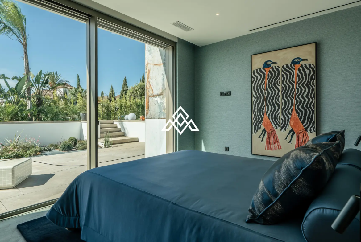 Luxury La Reserva villa for sale in Sotogrande with panoramic sea views and indoor swimming pool.