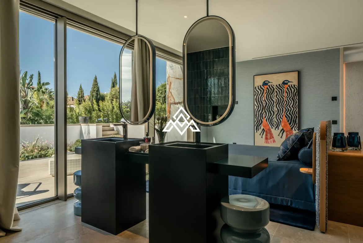 Luxury La Reserva villa for sale in Sotogrande with panoramic sea views and indoor swimming pool.